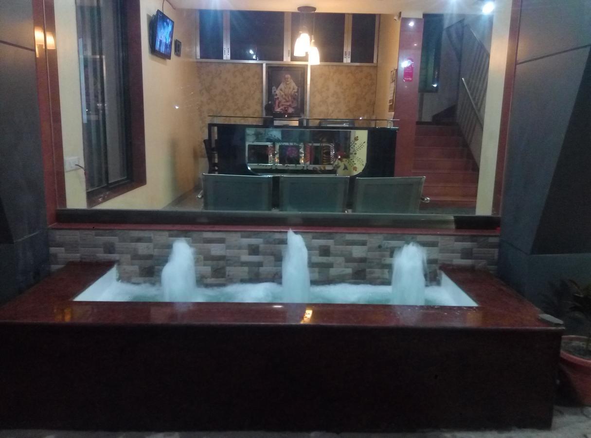 Hotel Yogiraj เชอร์ดี ภายนอก รูปภาพ